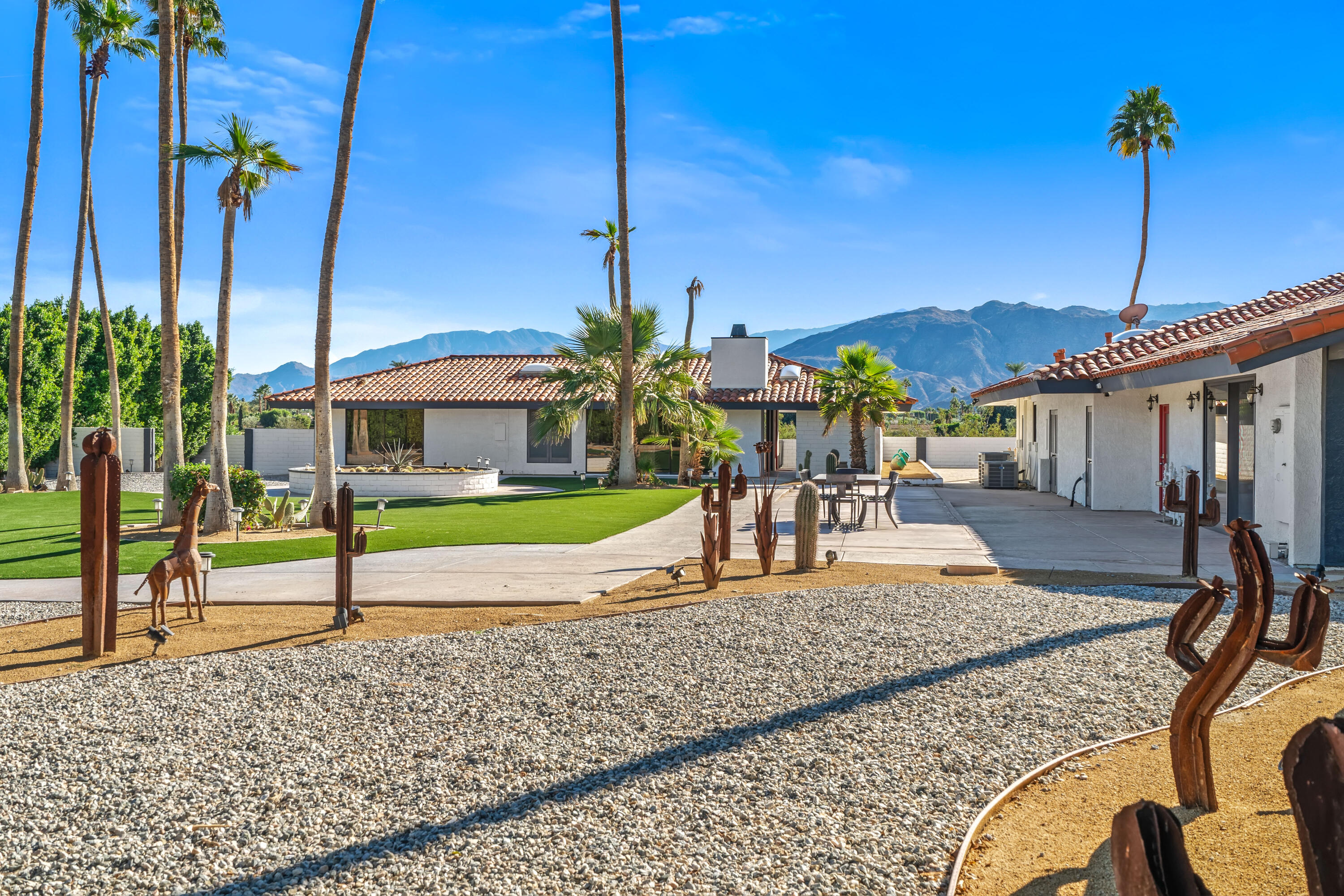 401 Iris Lane Rancho Mirage, CA 92270 - Photo 67 of 87 a view of a house with a yard