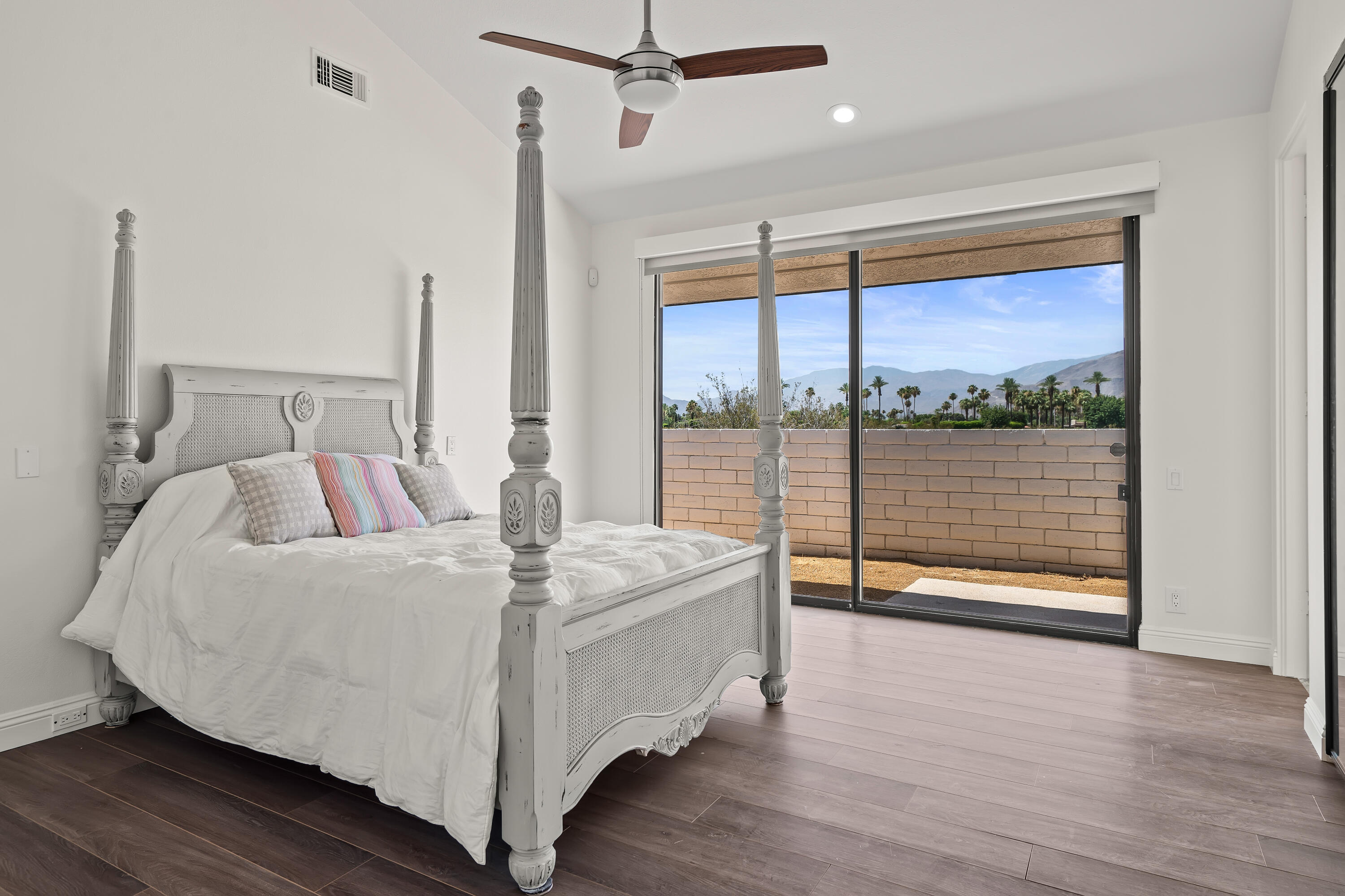 401 Iris Lane Rancho Mirage, CA 92270 - Photo 76 of 87 a bed sitting in a room next to a window