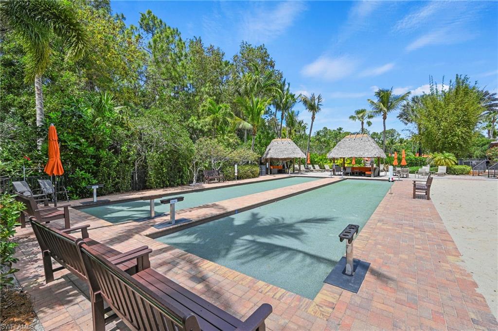 9098 Capistrano Street South, Unit 7103 Naples, FL 34113 - Photo 23 of 36 View of pool with patio surround, a game area, and a gazebo
