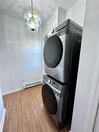 a utility room with dryer and washer