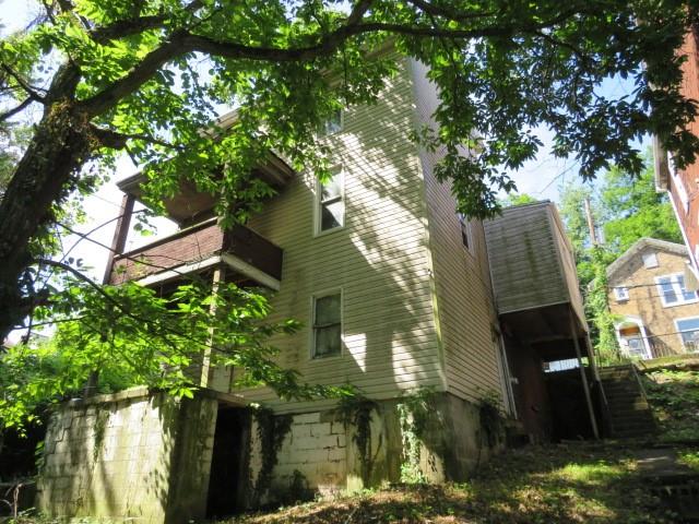 115 Chess Street Monongahela, PA 15063 - Photo 23 of 23 a backyard of a house with lots of green space