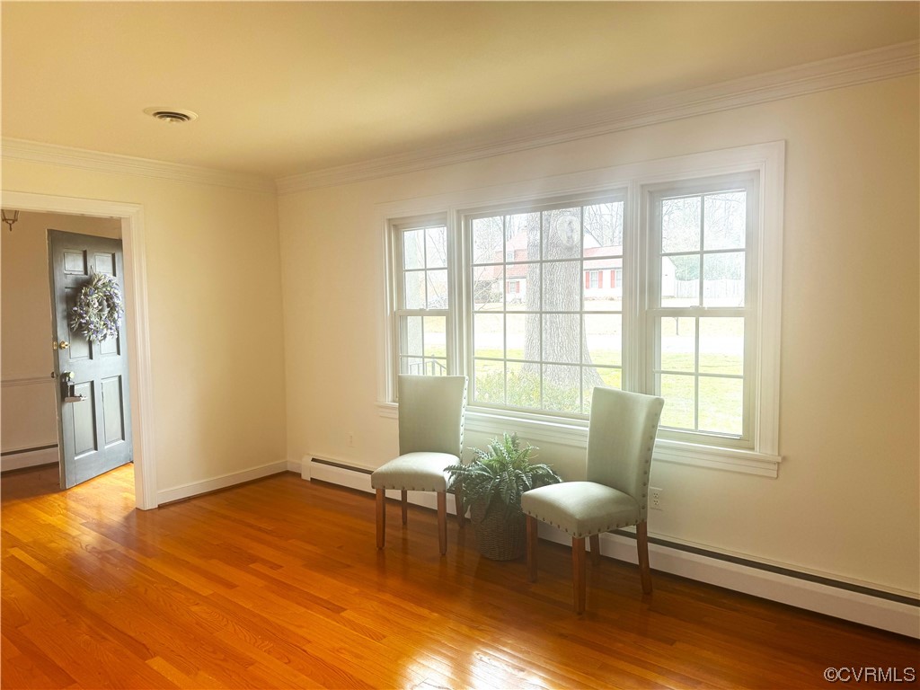 10901 Weybridge Road Chester, VA 23831 - Photo 20 of 32 a living room with furniture and a window