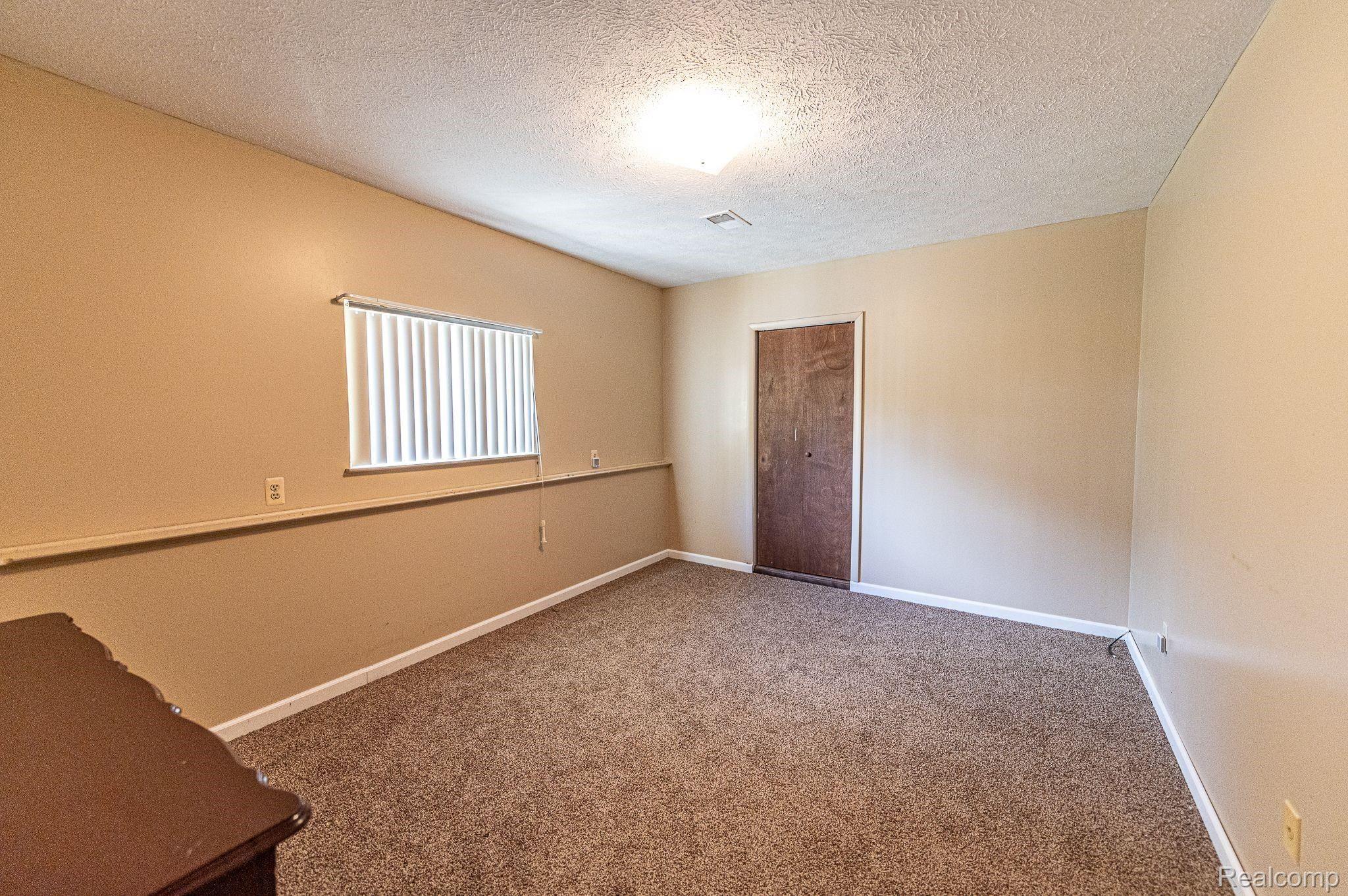 7881 Oak Grove Road Howell, MI 48855 - Photo 27 of 31 4th bedroom in basement.jpeg