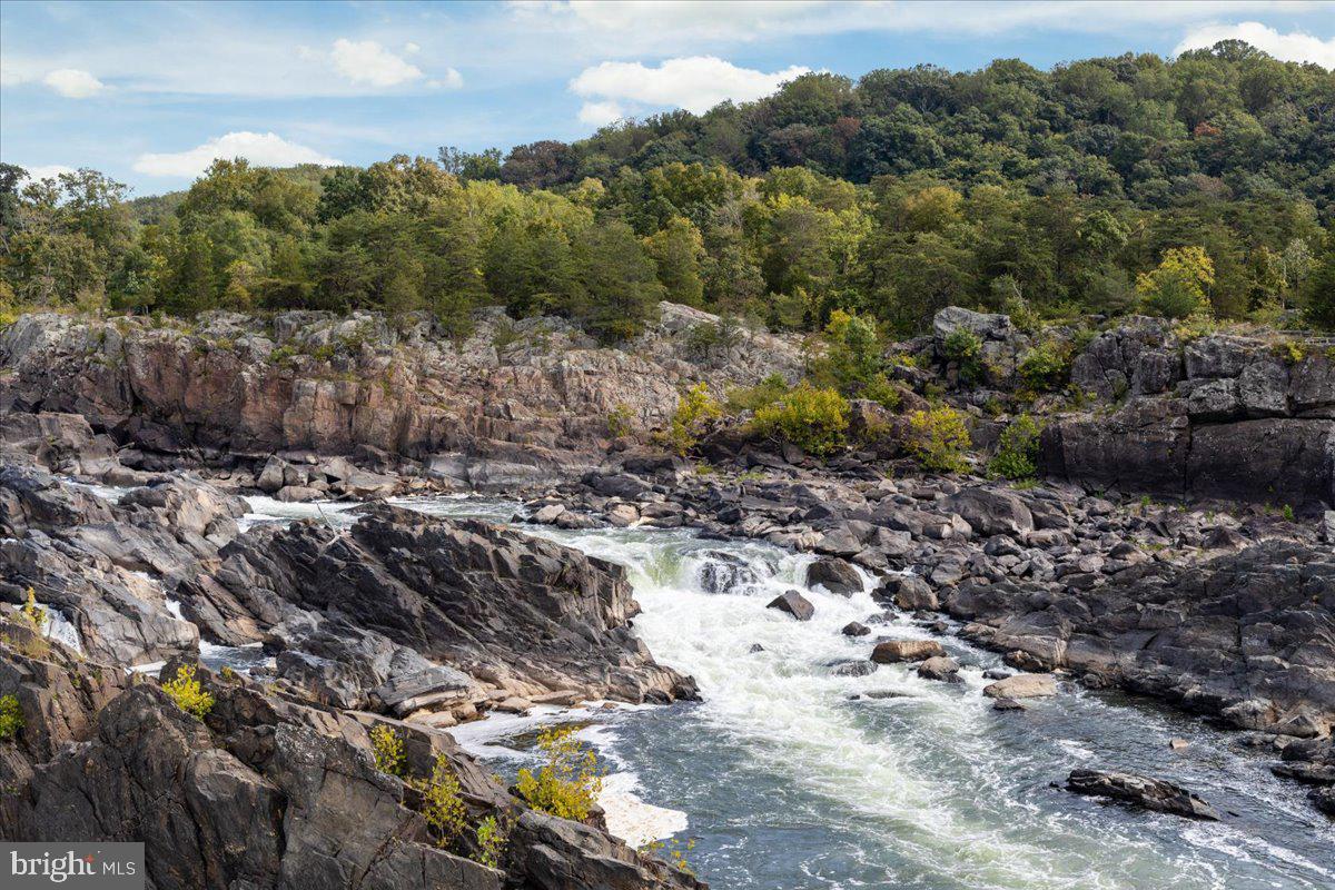 532 Walker Road Great Falls, VA 22066 - Photo 105 of 109 Serene river flows through rugged rocks.
