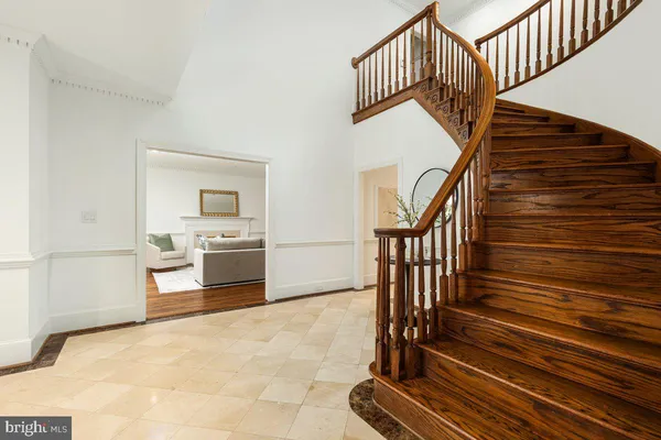 a kitchen with stainless steel appliances granite countertop a stove a refrigerator and a oven