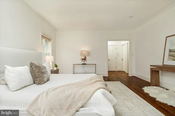 a view of a porch with wooden floor and fence