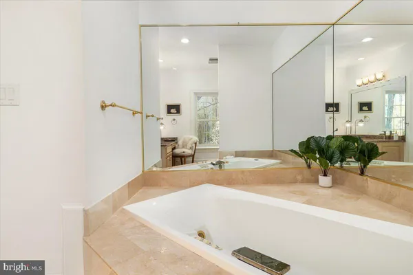 a view of a small house in the middle of a yard