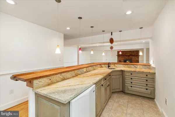 a brick house with table and chairs