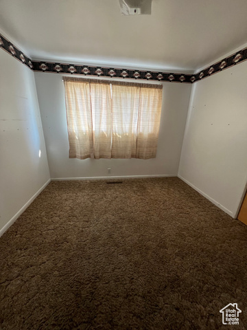 108 South Road Montpelier, ID 83254 - Photo 20 of 36 Unfurnished room with carpet floors and baseboards