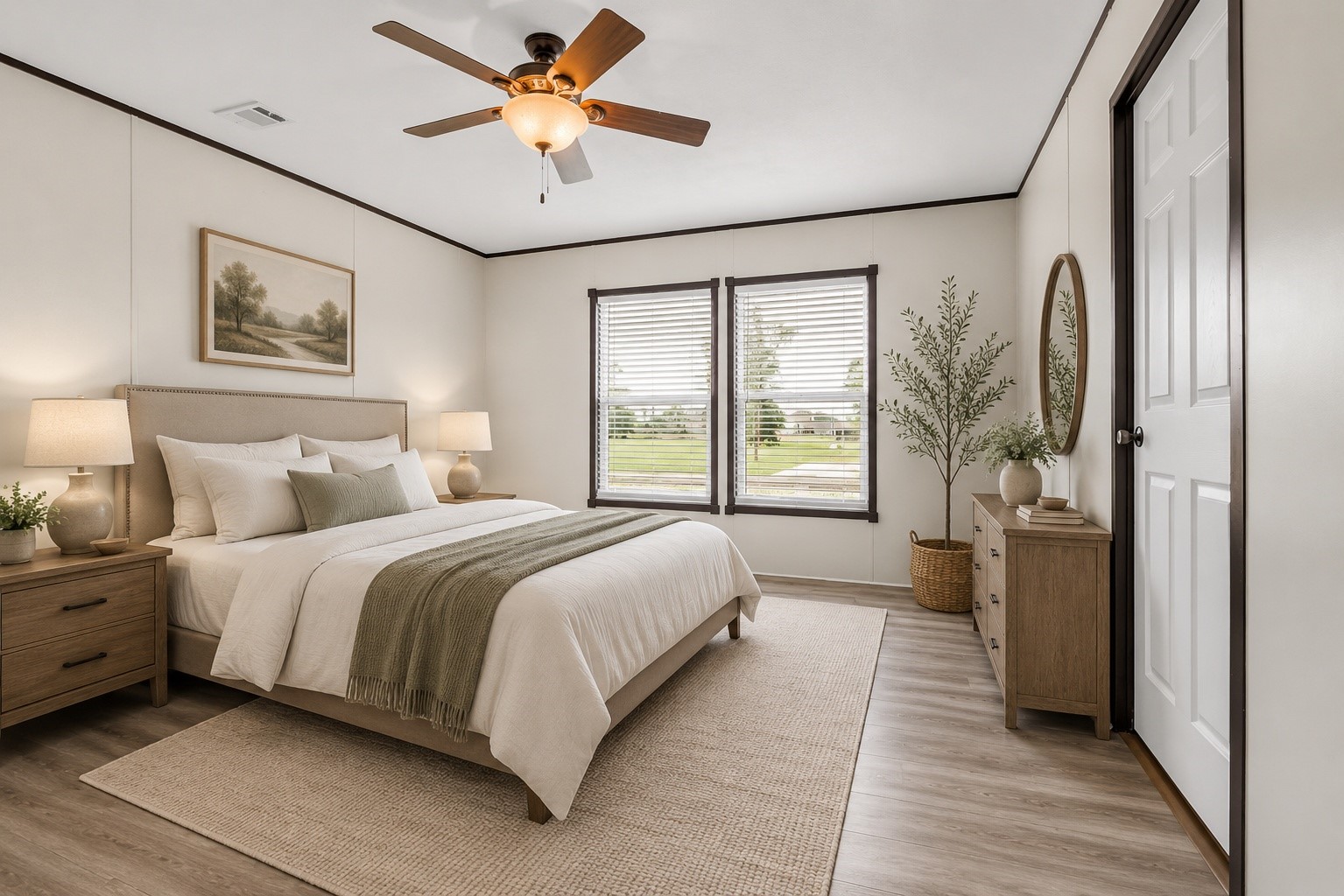 15158 Schank Road Conroe, TX 77306 - Photo 10 of 17 a bedroom with a large bed and a chandelier fan