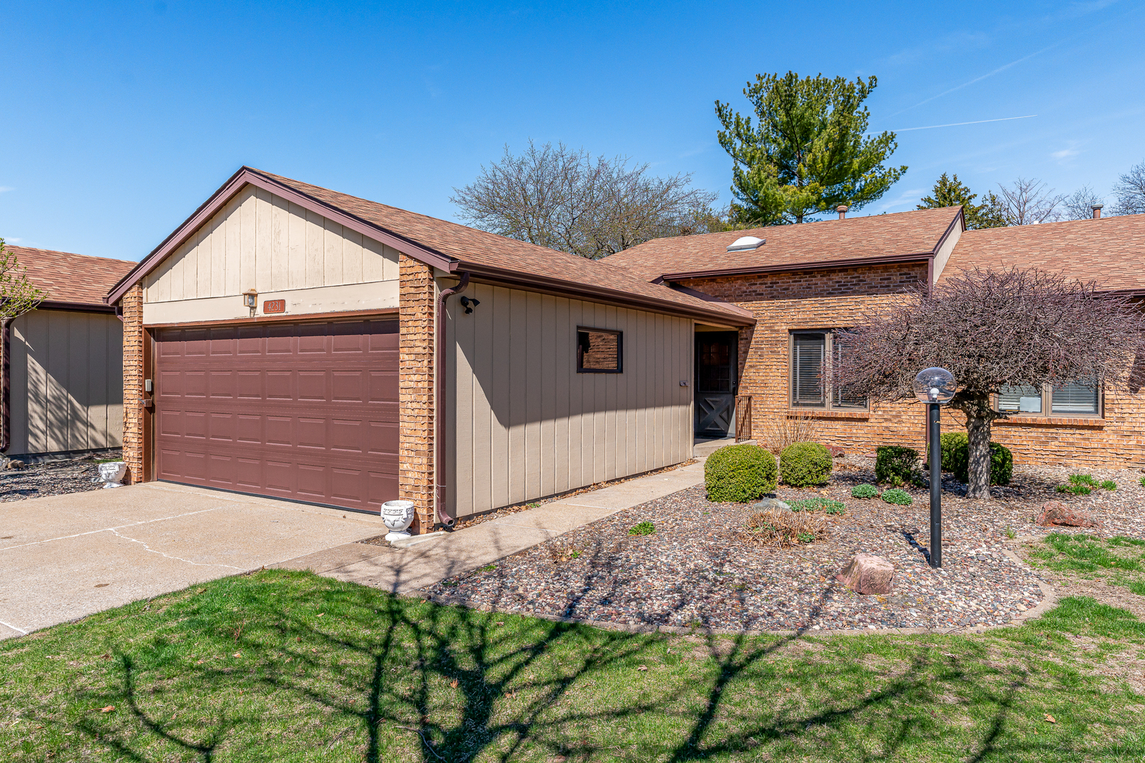 4231 26th Avenue Moline, IL 61265 - Photo 1 of 18 a view of house with a yard and potted plants