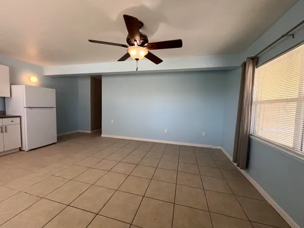 a view of an empty room and window