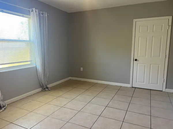 an empty room with cabinet