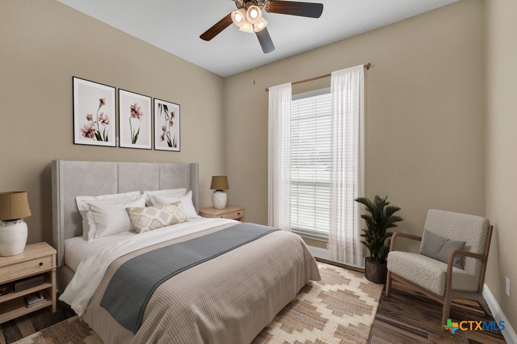 2194 Ranch Loop Drive New Braunfels, TX 78132 - Photo 18 of 48 a bedroom with a bed and a couch