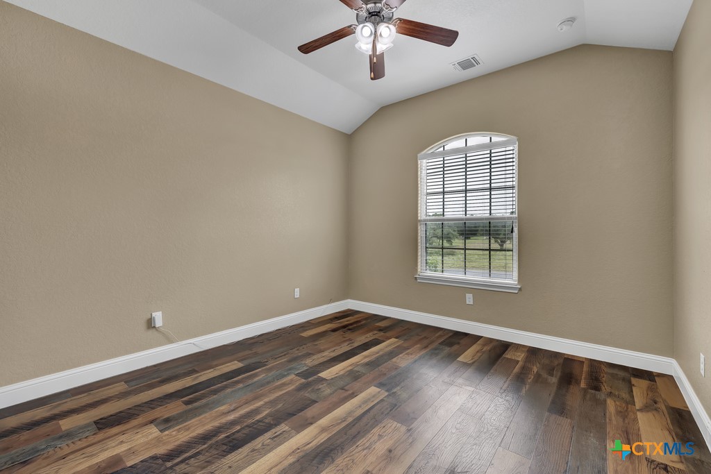 2194 Ranch Loop Drive New Braunfels, TX 78132 - Photo 28 of 48 a view of wooden floor and windows in a room
