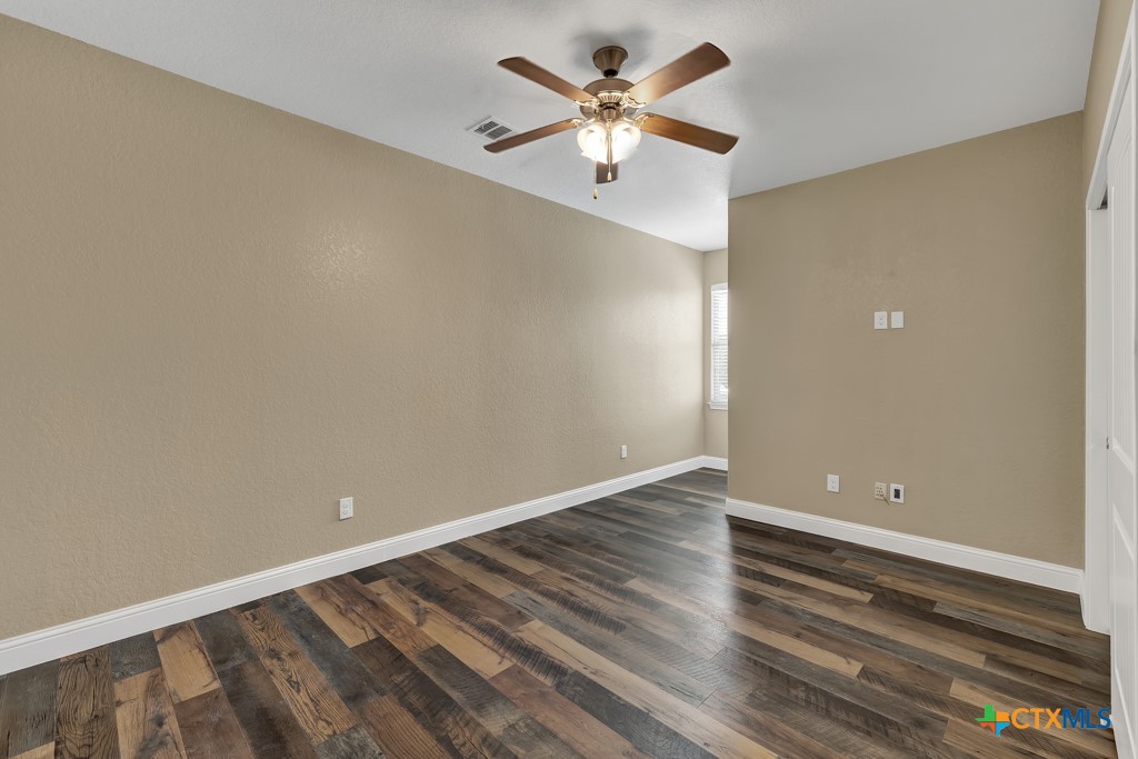 2194 Ranch Loop Drive New Braunfels, TX 78132 - Photo 30 of 48 wooden floor in an empty room