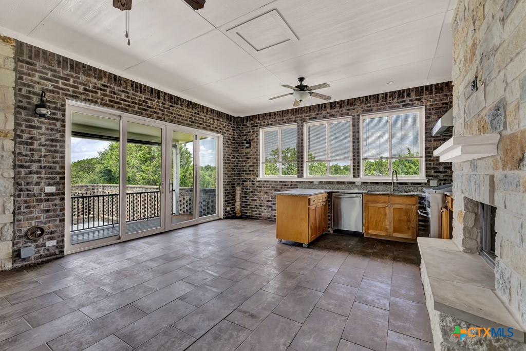 2194 Ranch Loop Drive New Braunfels, TX 78132 - Photo 32 of 48 a large white kitchen with a large window