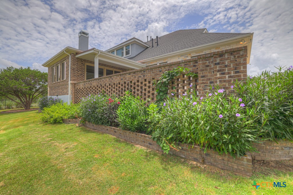 2194 Ranch Loop Drive New Braunfels, TX 78132 - Photo 37 of 48 front view of a house with a yard