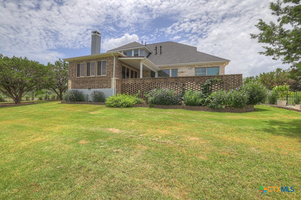 2194 Ranch Loop Drive New Braunfels, TX 78132 - Photo 38 of 48 a front view of a house with a yard