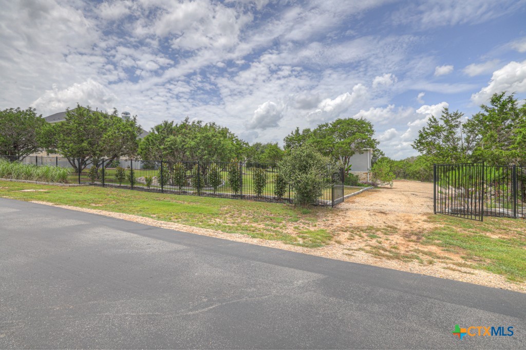 2194 Ranch Loop Drive New Braunfels, TX 78132 - Photo 40 of 48 a view of a yard with an trees