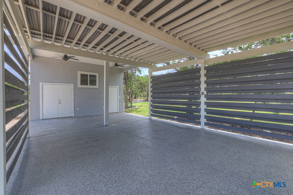 2194 Ranch Loop Drive New Braunfels, TX 78132 - Photo 42 of 48 a view of empty room with stairs and a kitchen