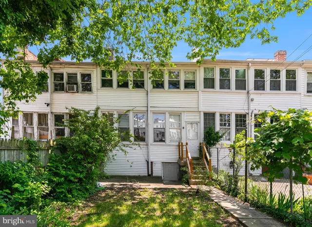 a view of front a house with a tree