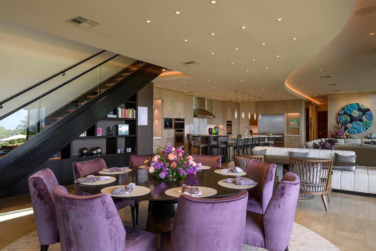 4809 Lower Honoapiilani Road Lahaina, HI 96761 - Photo 11 of 49 a dining room with lots of furniture and a chandelier