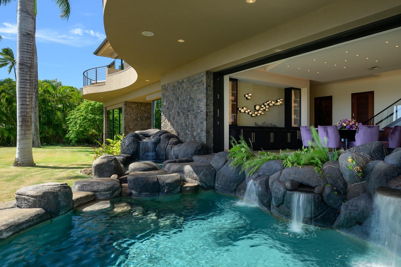 4809 Lower Honoapiilani Road Lahaina, HI 96761 - Photo 14 of 49 a view of a patio with couches chairs and a fire pit