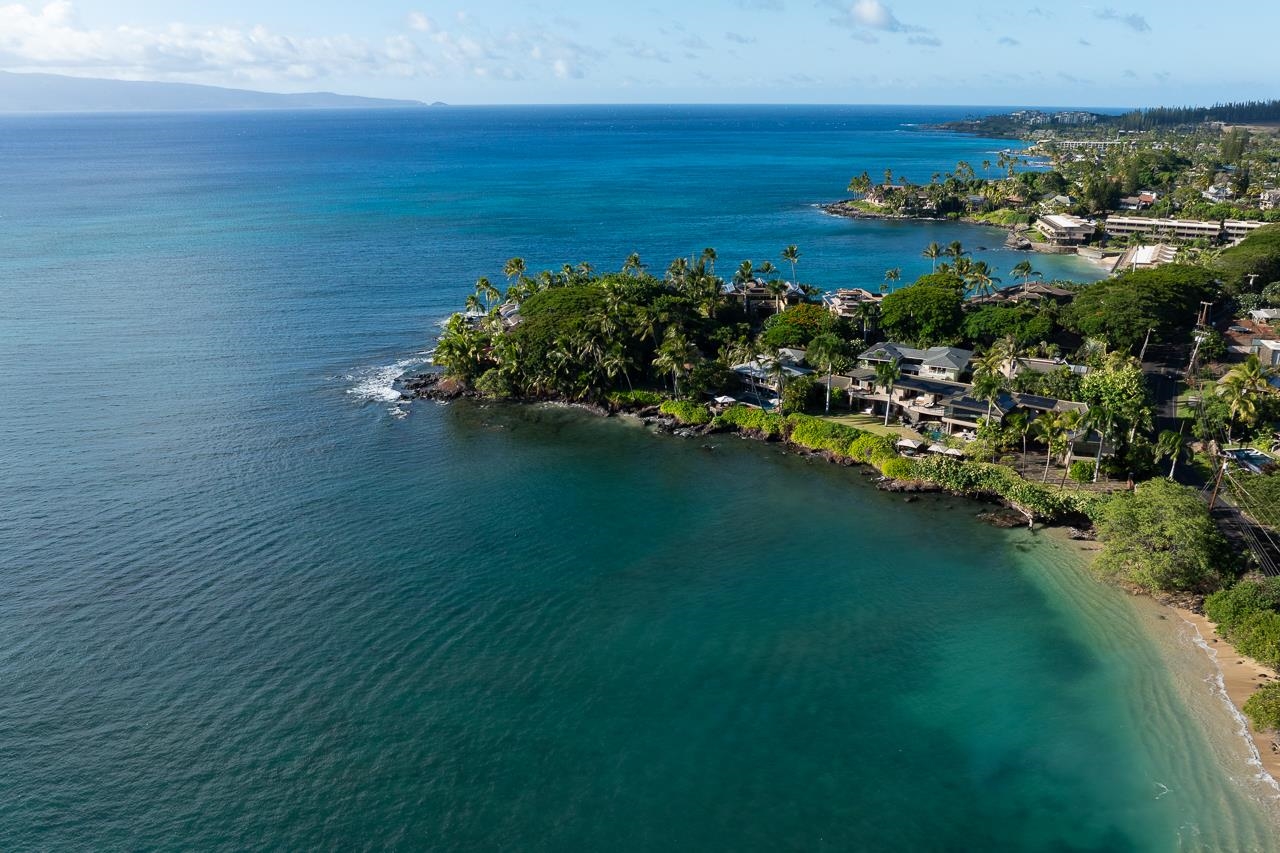 4809 Lower Honoapiilani Road Lahaina, HI 96761 - Photo 3 of 49 a view of a lake with houses in back