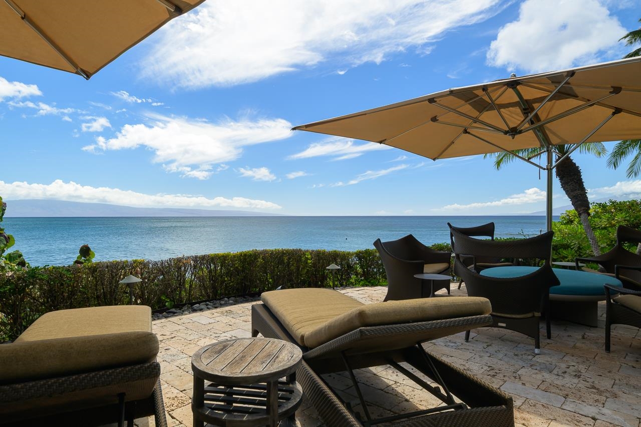 4809 Lower Honoapiilani Road Lahaina, HI 96761 - Photo 39 of 49 a roof deck with patio and outdoor seating