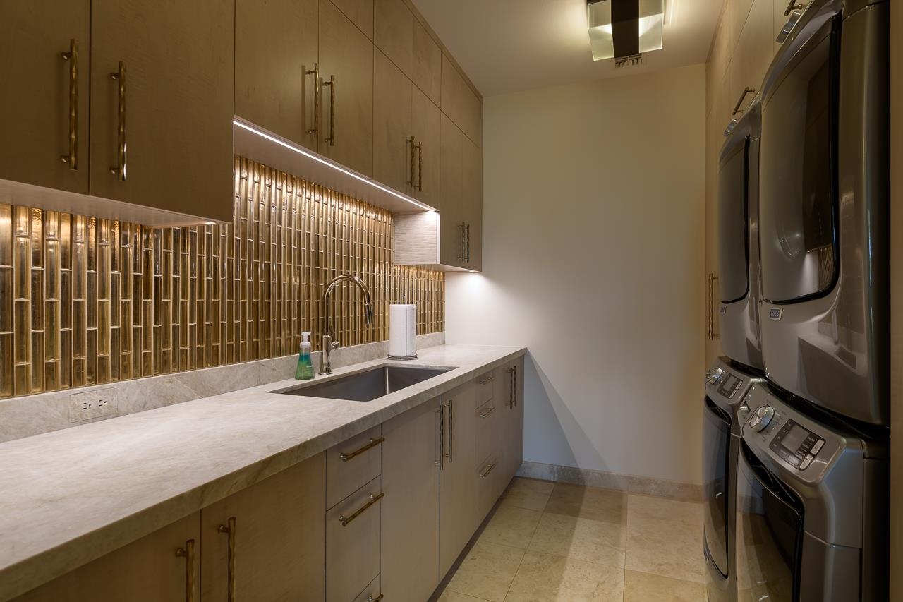 4809 Lower Honoapiilani Road Lahaina, HI 96761 - Photo 41 of 49 a bathroom with a sink and a mirror