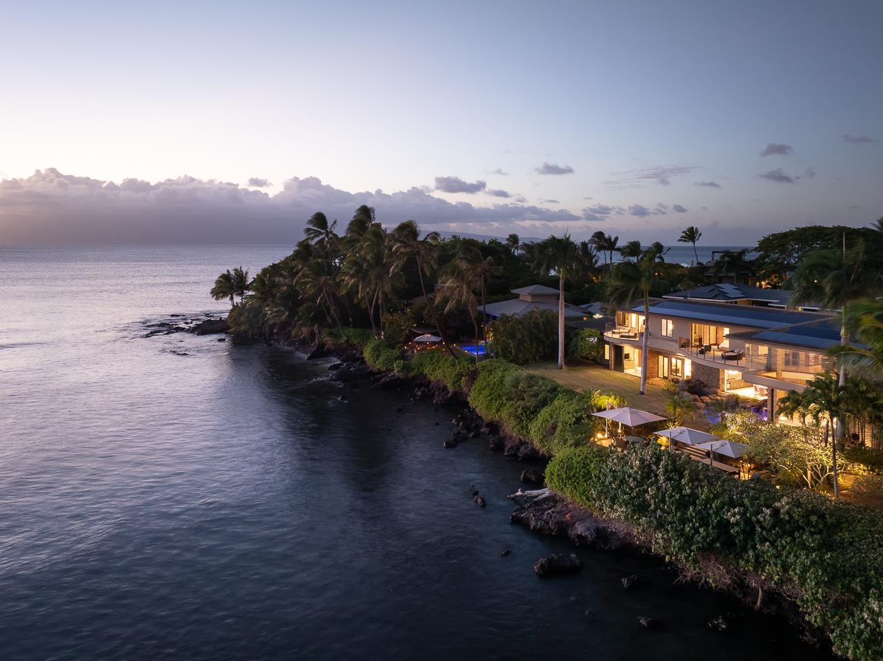 4809 Lower Honoapiilani Road Lahaina, HI 96761 - Photo 47 of 49 an aerial view of a house with a yard and lake view