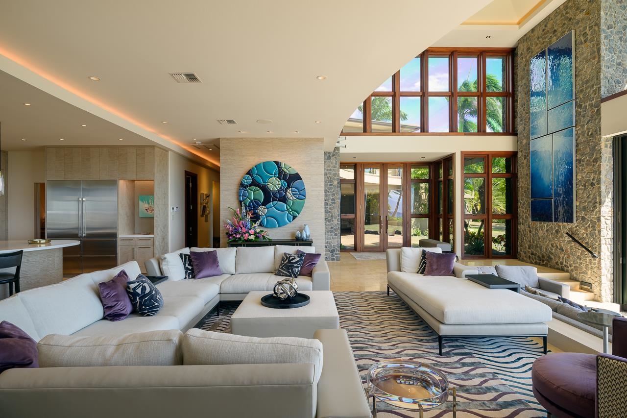 4809 Lower Honoapiilani Road Lahaina, HI 96761 - Photo 6 of 49 a living room with furniture a large window and a potted plant