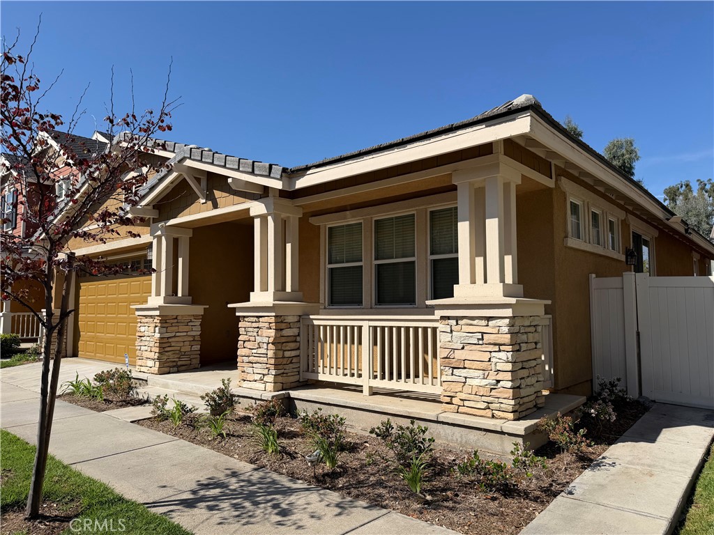 11012 Ragsdale Road Loma Linda, CA 92354 - Photo 2 of 27 a front view of a house with a yard