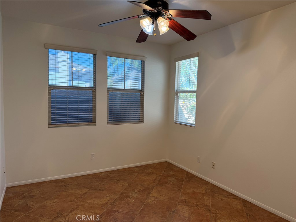 11012 Ragsdale Road Loma Linda, CA 92354 - Photo 21 of 27 an empty room with windows and fan