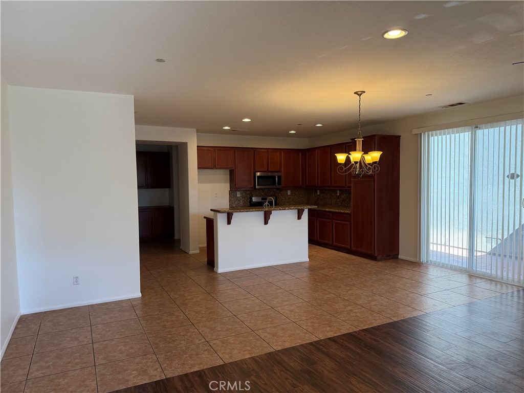 11012 Ragsdale Road Loma Linda, CA 92354 - Photo 3 of 27 a view of kitchen with kitchen island