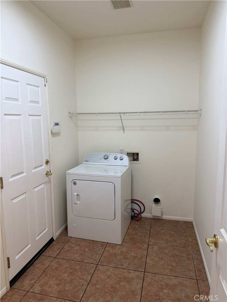 11012 Ragsdale Road Loma Linda, CA 92354 - Photo 10 of 27 a utility room with dryer and washer