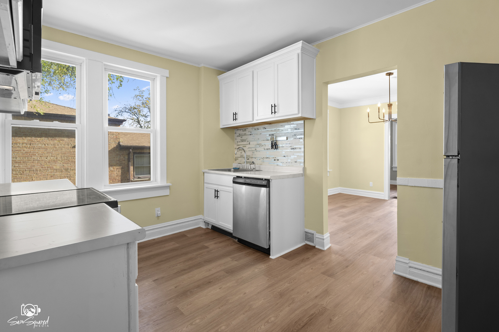 7236 West 63rd Place, Unit A Summit, IL 60501 - Photo 14 of 19 a kitchen with a refrigerator and a stove top oven