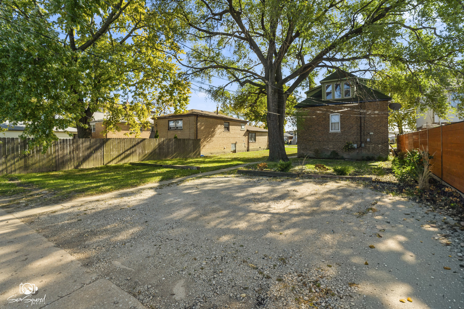 7236 West 63rd Place, Unit A Summit, IL 60501 - Photo 18 of 19 a view of a house with a yard