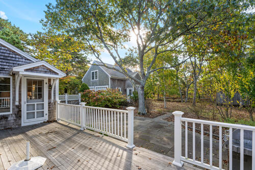 52 Marthas Road Edgartown, MA 02539 - Photo 32 of 36 a front view of a house with a garden