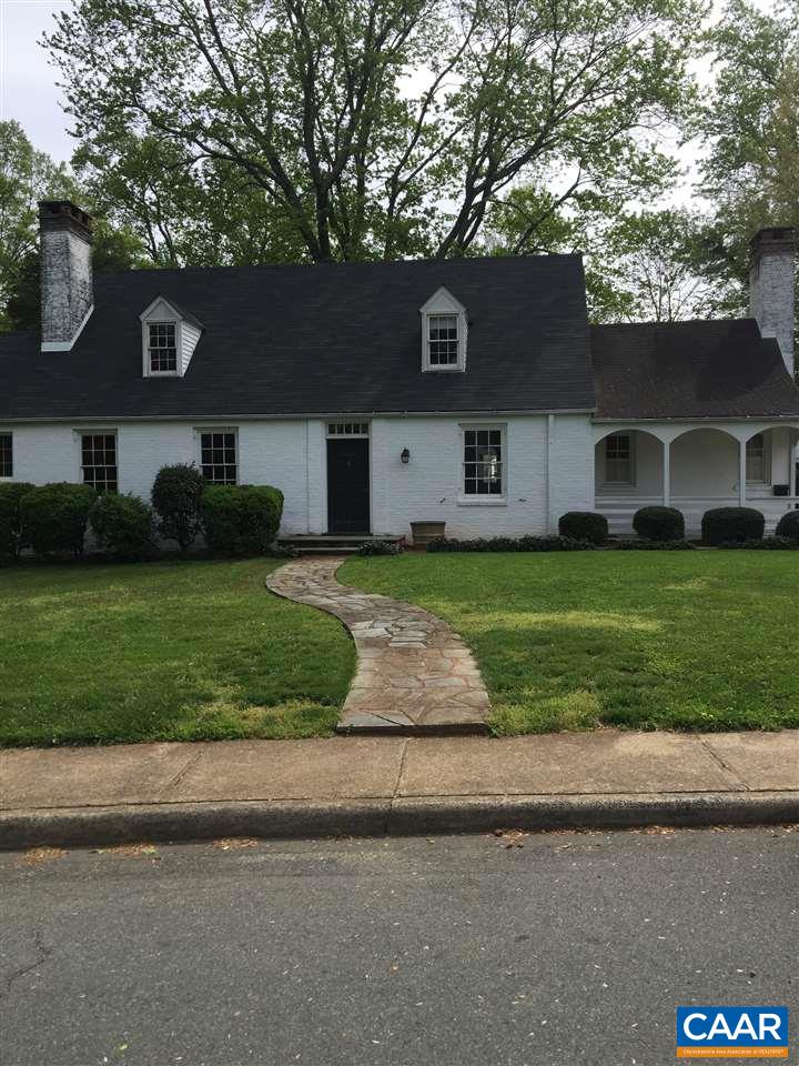 1948 Lewis Mountain Road Charlottesville, VA 22903 - Photo 1 of 2 a front view of a house with a yard and garage