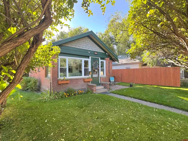 a view of a small house with a sink