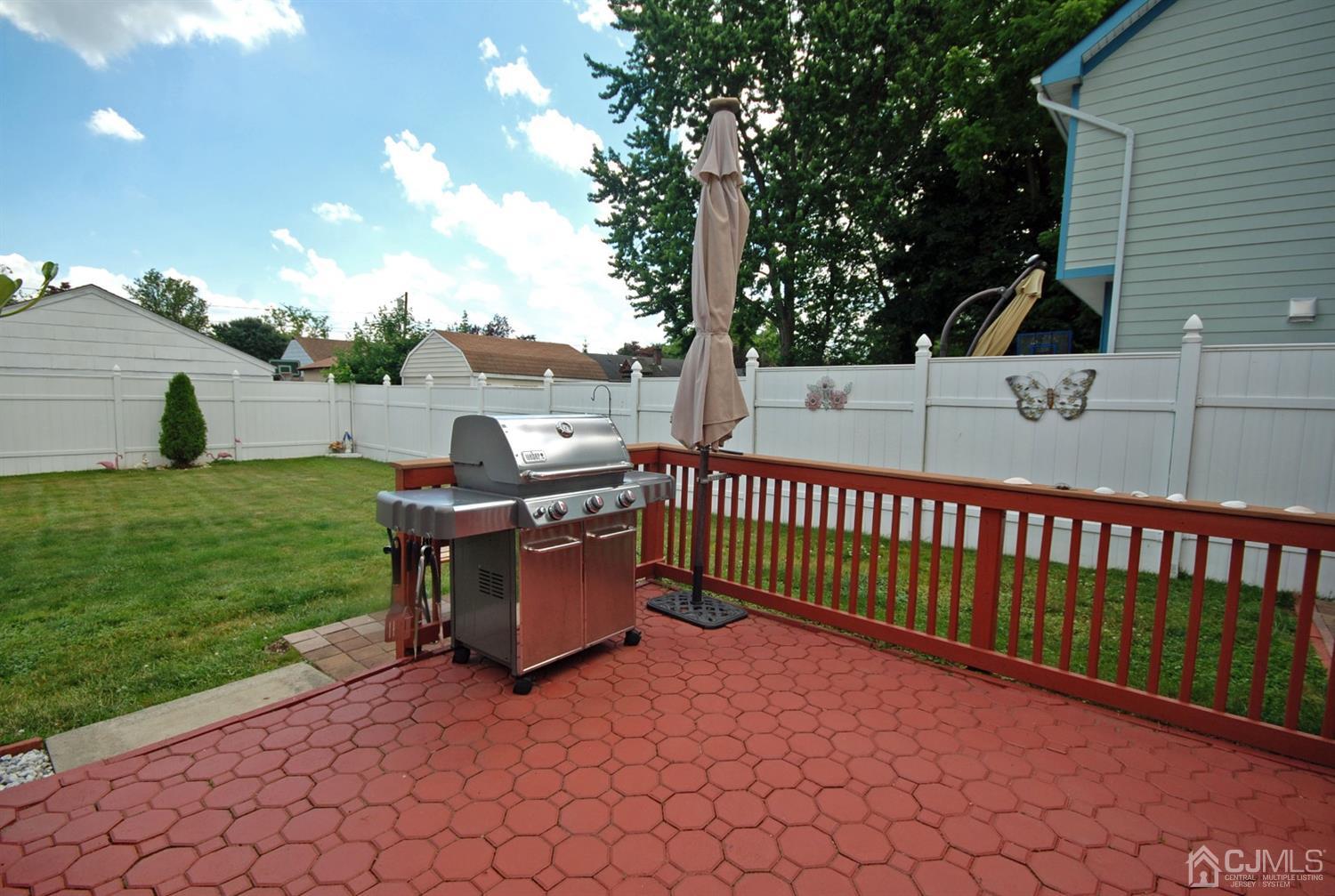243 Old Post Road Edison, NJ 08817 - Photo 22 of 26 a view of a garden and deck