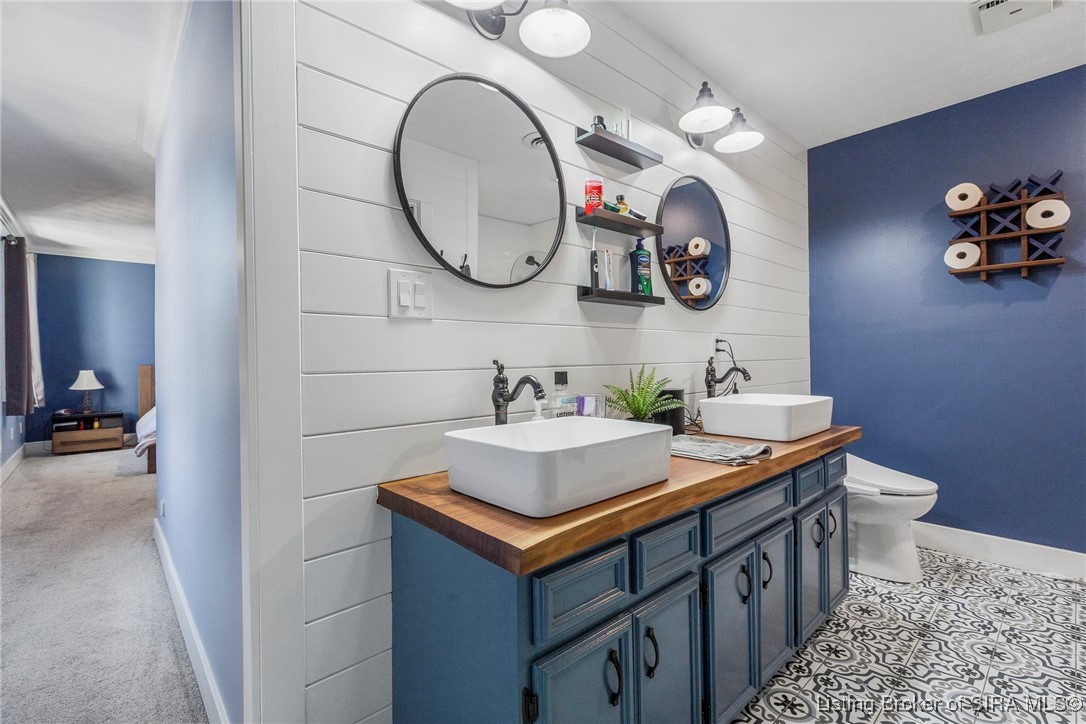 10185 Cooks Mill Road Georgetown, IN 47122 - Photo 35 of 75 The master bath exudes timeless charm with its dou