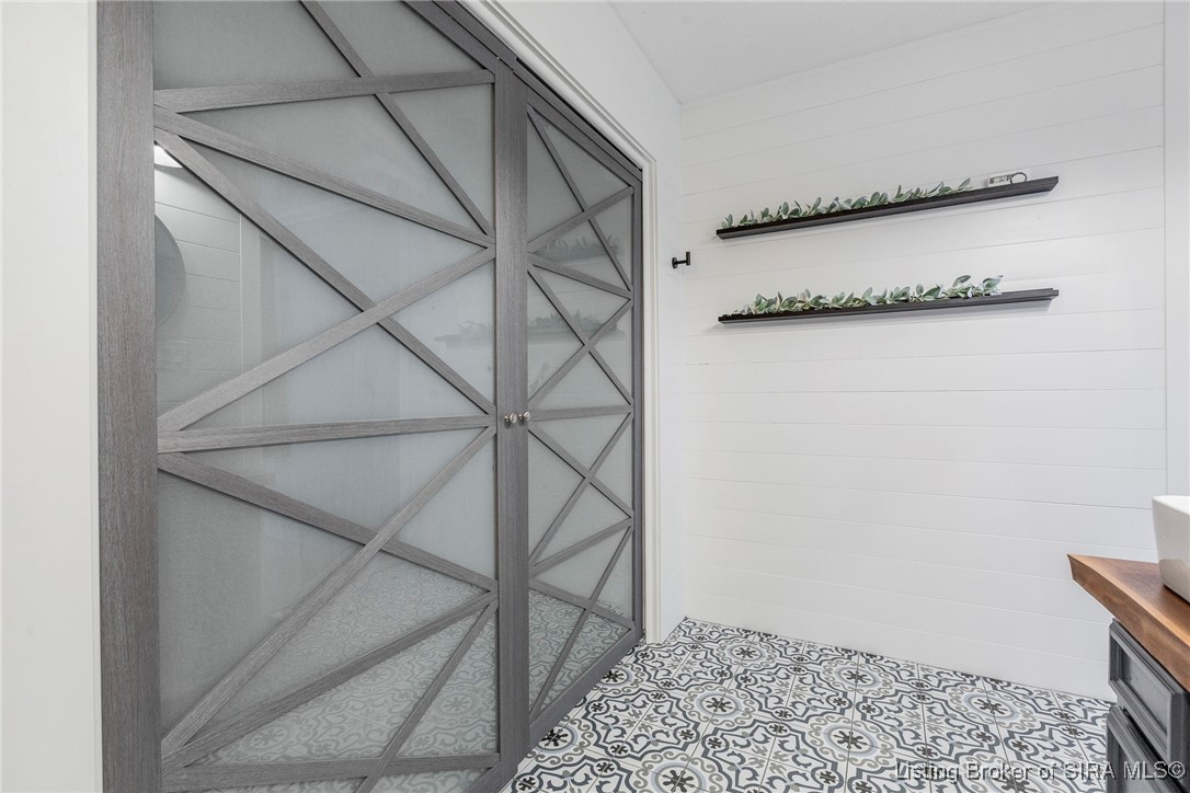 10185 Cooks Mill Road Georgetown, IN 47122 - Photo 37 of 75 Super cool glass doors with warm wood accents make