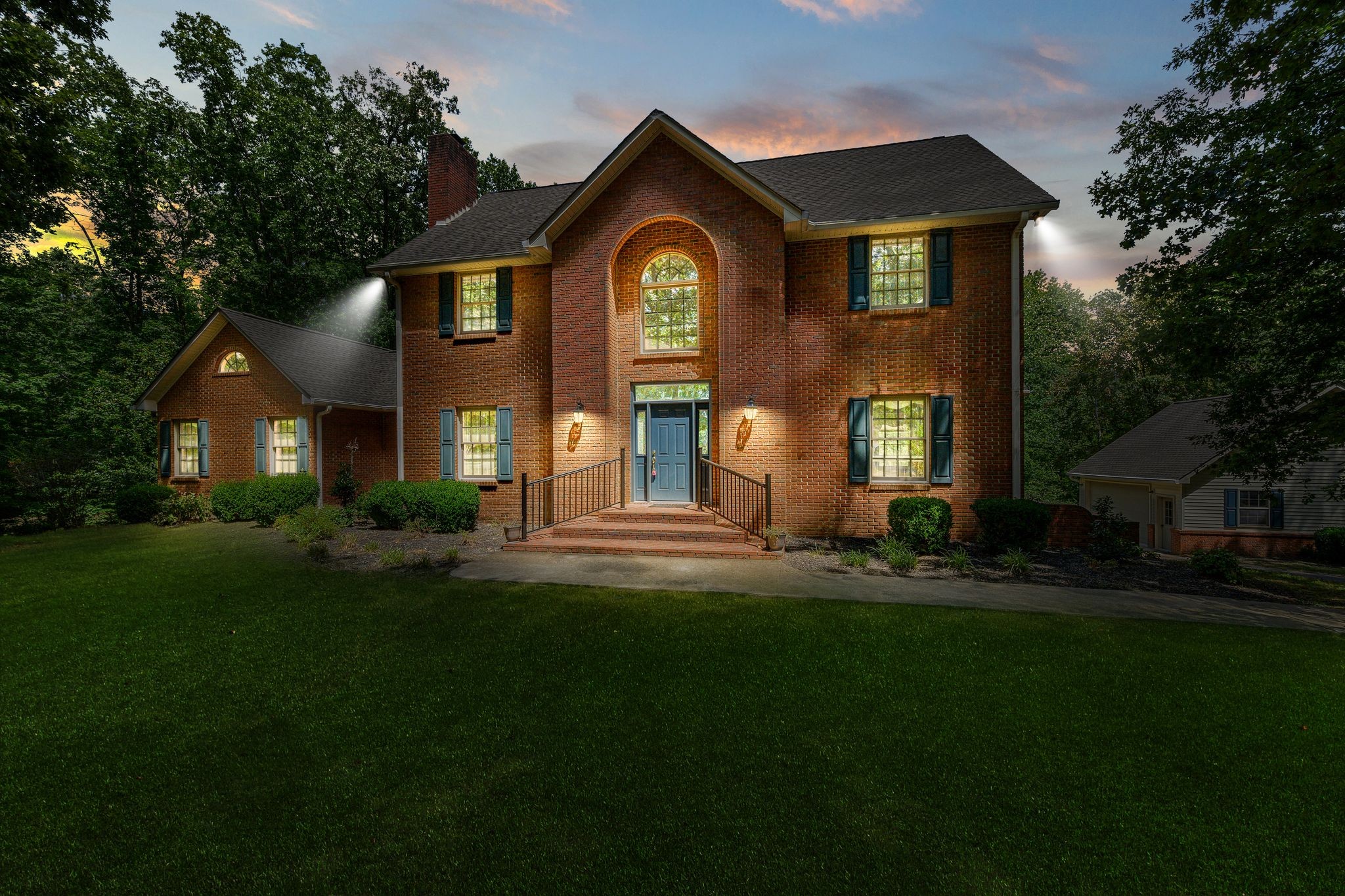 570 Gregson Place Waverly, TN 37185 - Photo 15 of 77 a front view of a house with a garden