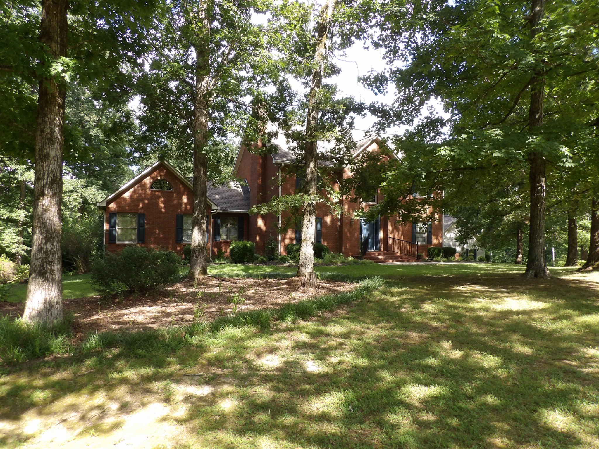 570 Gregson Place Waverly, TN 37185 - Photo 16 of 77 a view of a house with a yard