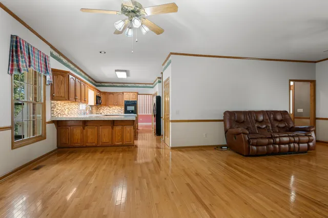 a view of room with window and floor to ceiling window