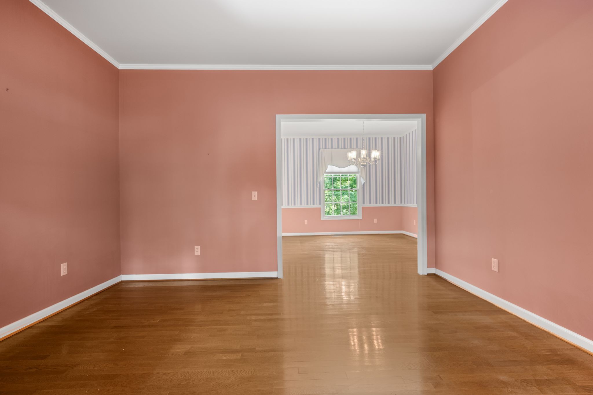 570 Gregson Place Waverly, TN 37185 - Photo 32 of 77 a view of an empty room with wooden floor and a window