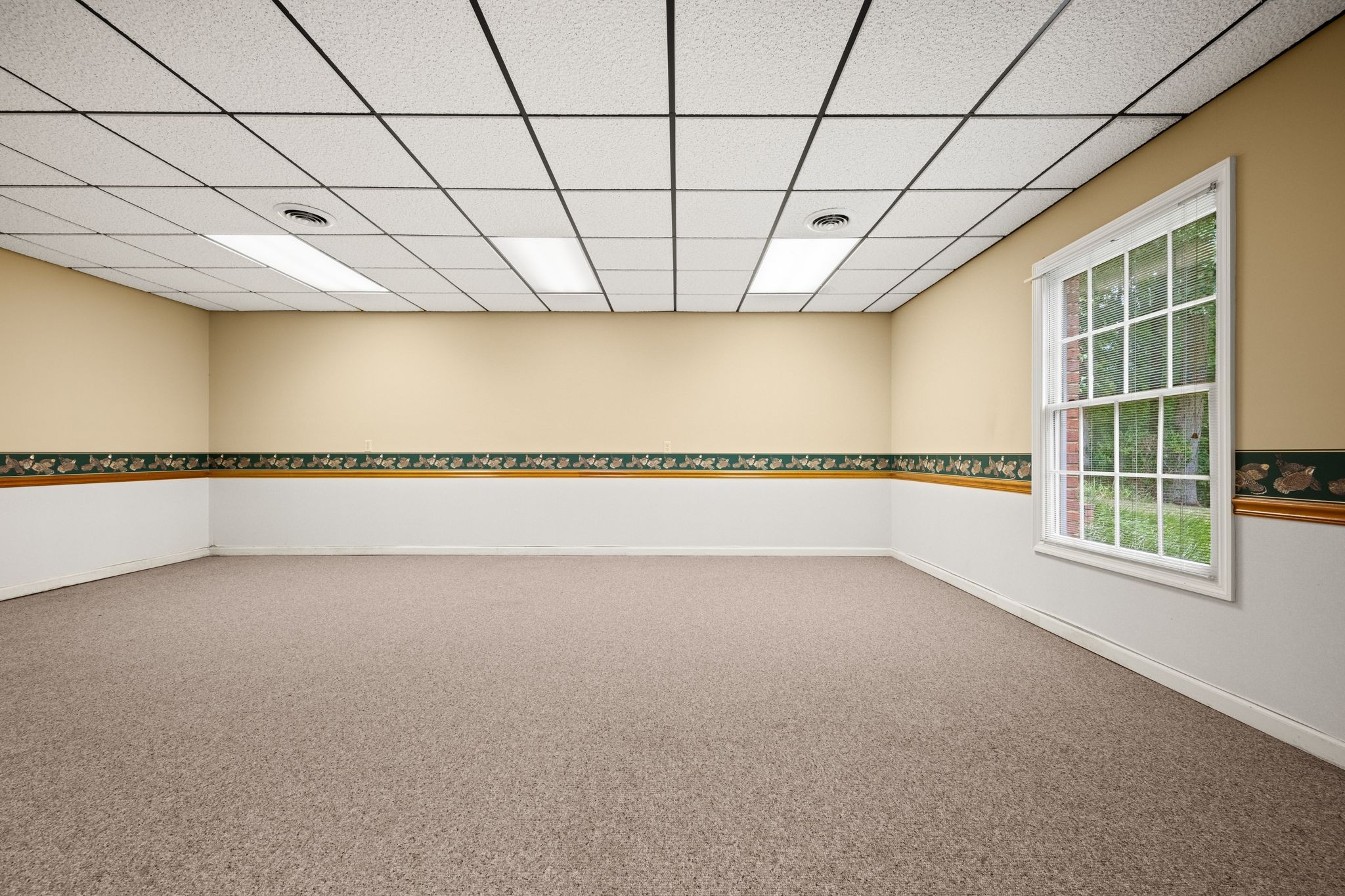 570 Gregson Place Waverly, TN 37185 - Photo 54 of 77 a view of a big room with windows